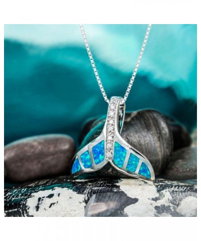 Sterling Silver Whale Tail CZ Accented Necklace Pendant with Simulated Blue Opal and 18" Box Chain $15.14 Necklaces